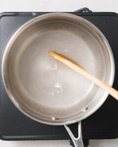 water sugar salt and vinegar added to pan and boiled for a few minutes.