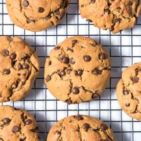 baked chocolate chip cookies on a wire rack to cool.