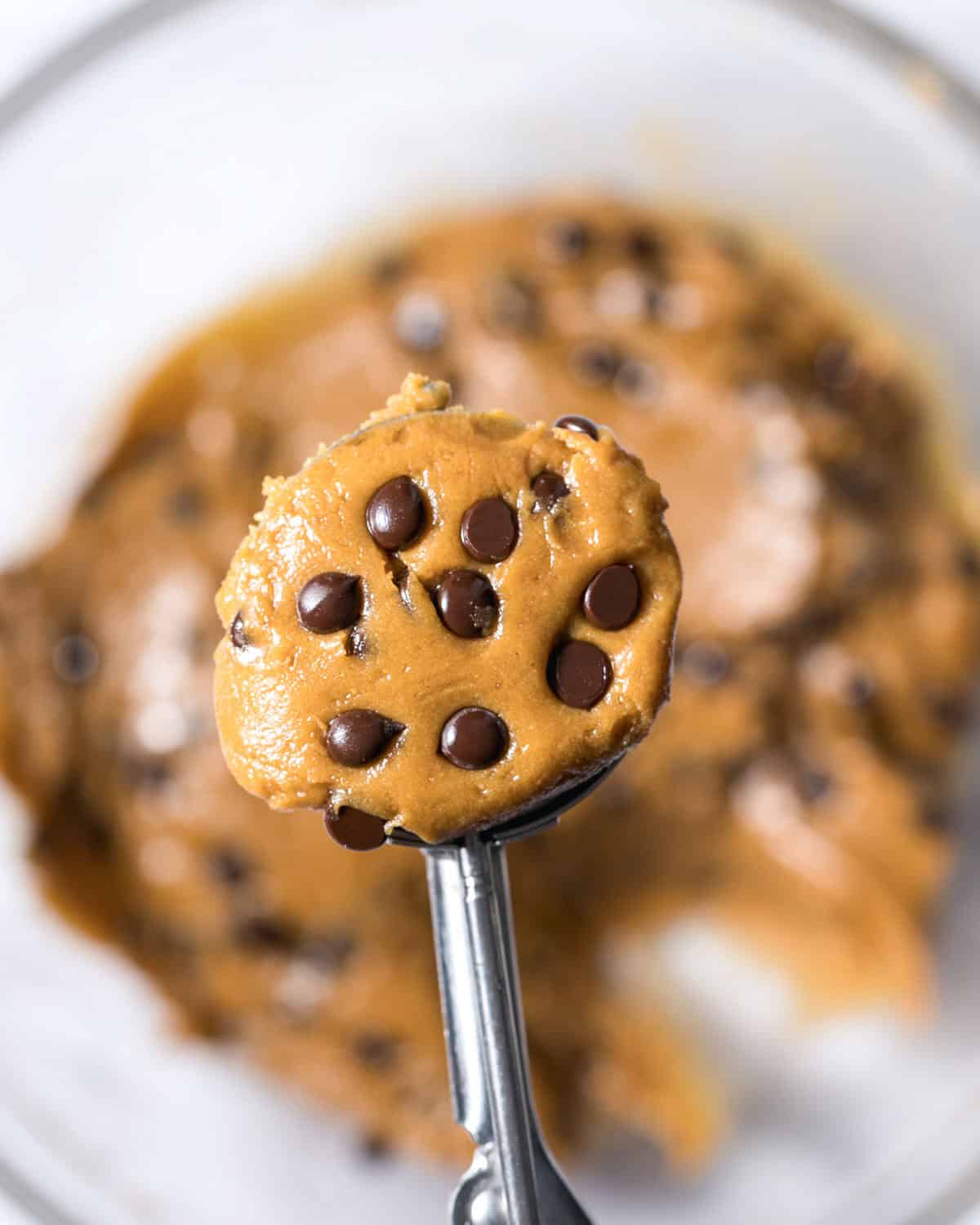 a scoop of raw cookie dough with chocolate chips.