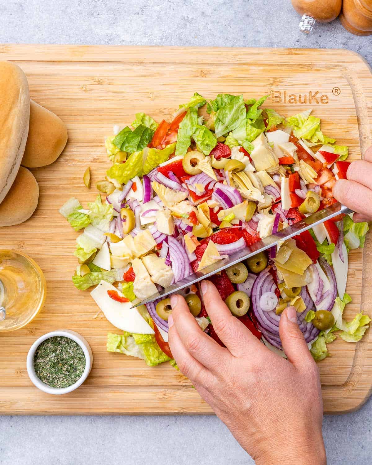 Chopping veggies on a cutting board.