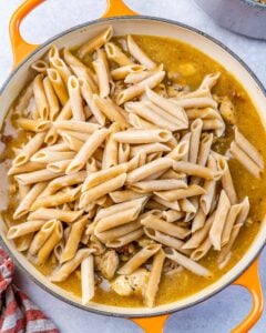 cooked pasta added over the creamy chicken sauce