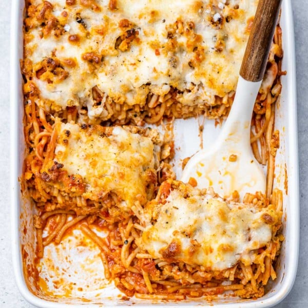 top view of casserole dish with baked spaghetti and melted cheese