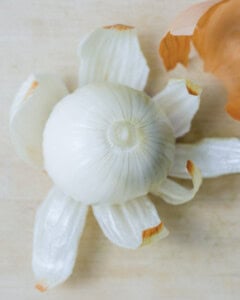 peeled whole onion.