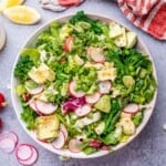 A round bowl of green salad.