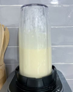 cottage cheese and eggs blended in a blender cup.