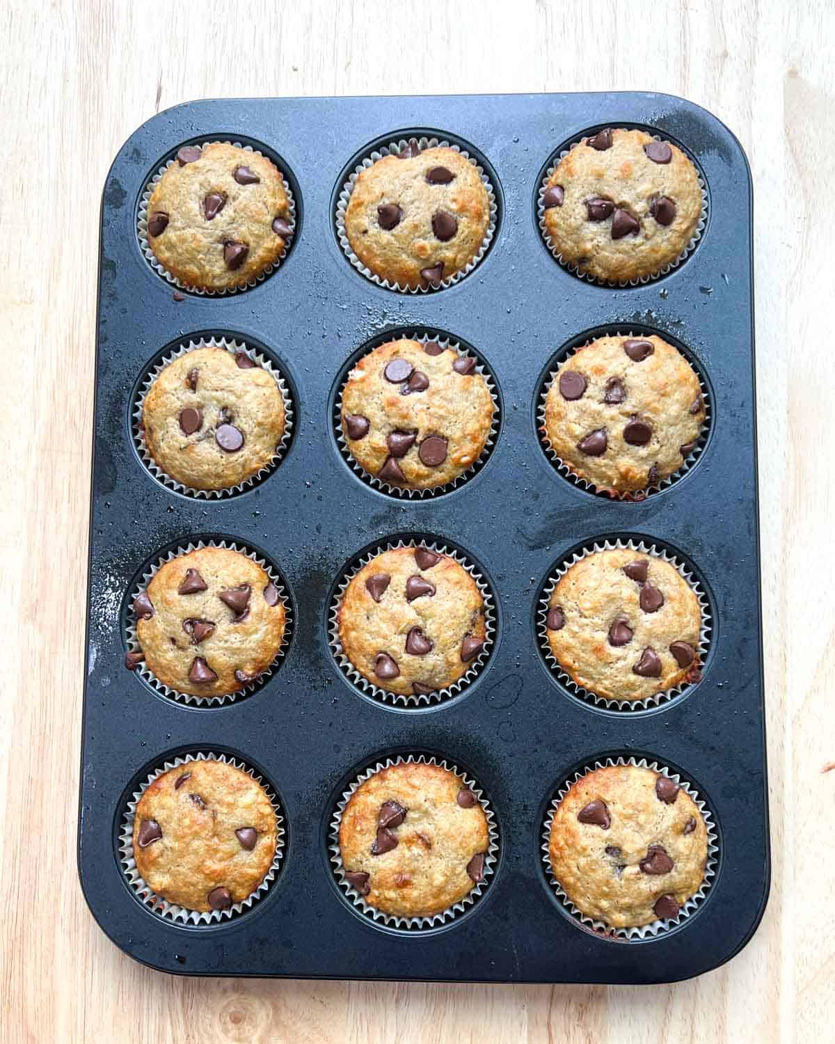 banana muffins baked in a muffin pan.