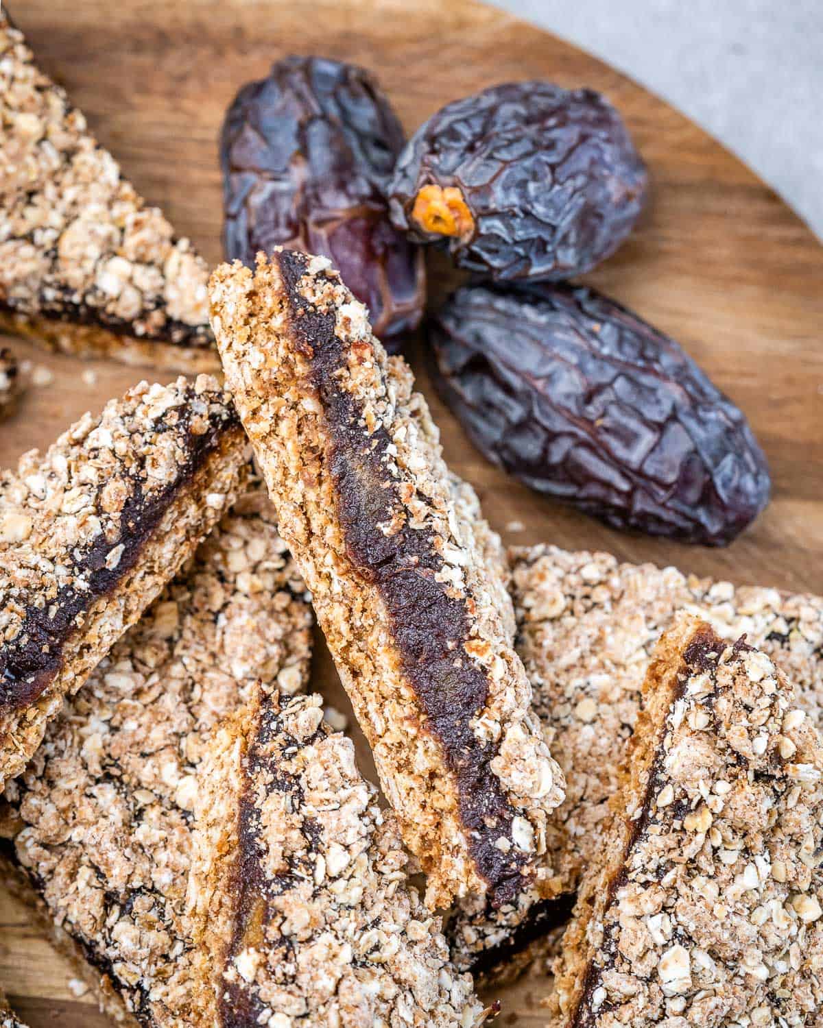 date bars cut into smaller pieces and place on a cutting board.