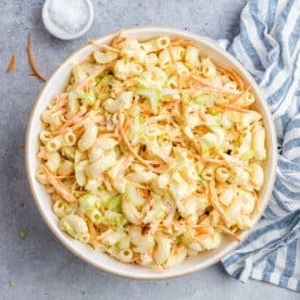 A large bowl of hawaiian mac salad with vibrant colors and creamy texture.