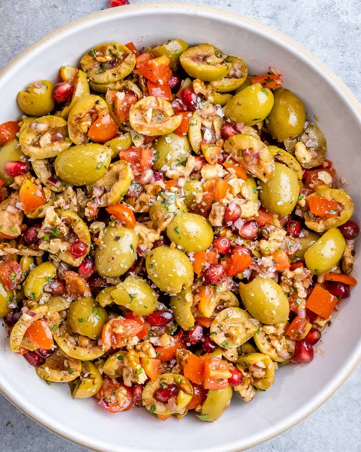 Close up of olive salad fully mixed and ready to serve.