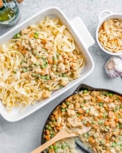 Overhead shot showing the cooked noodles being mixed with the creamy chicken and veggie filling.