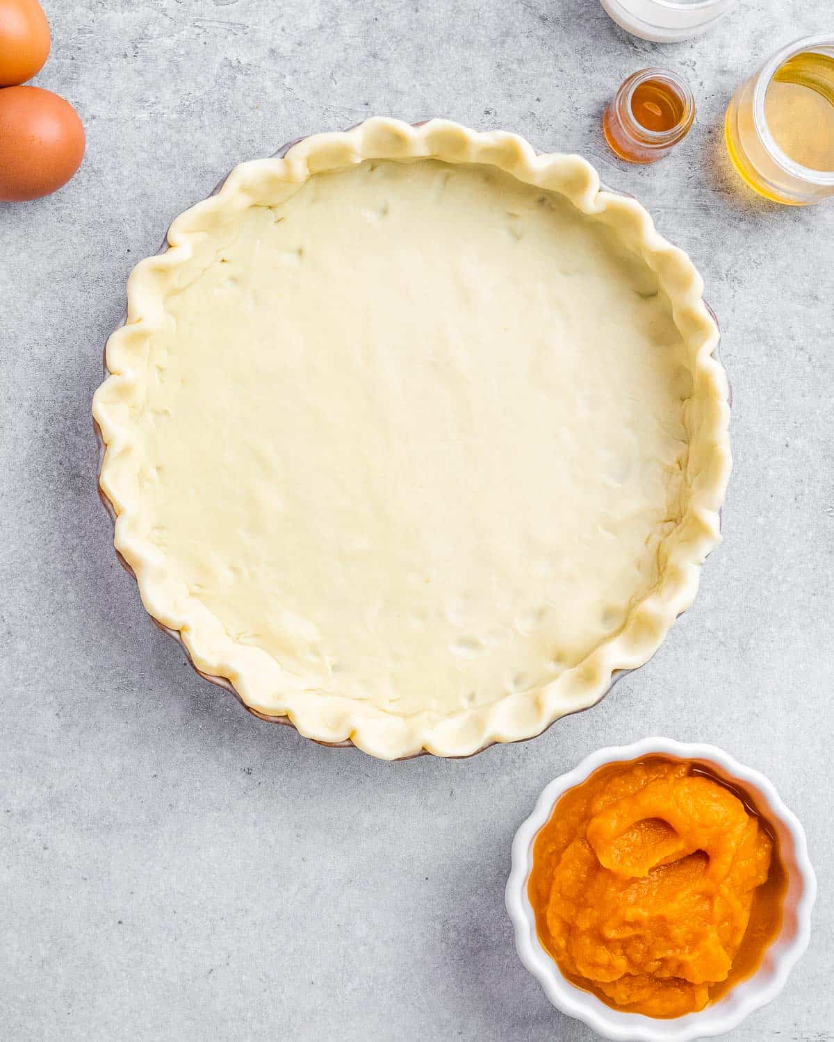 Pie crust in a pie plate.