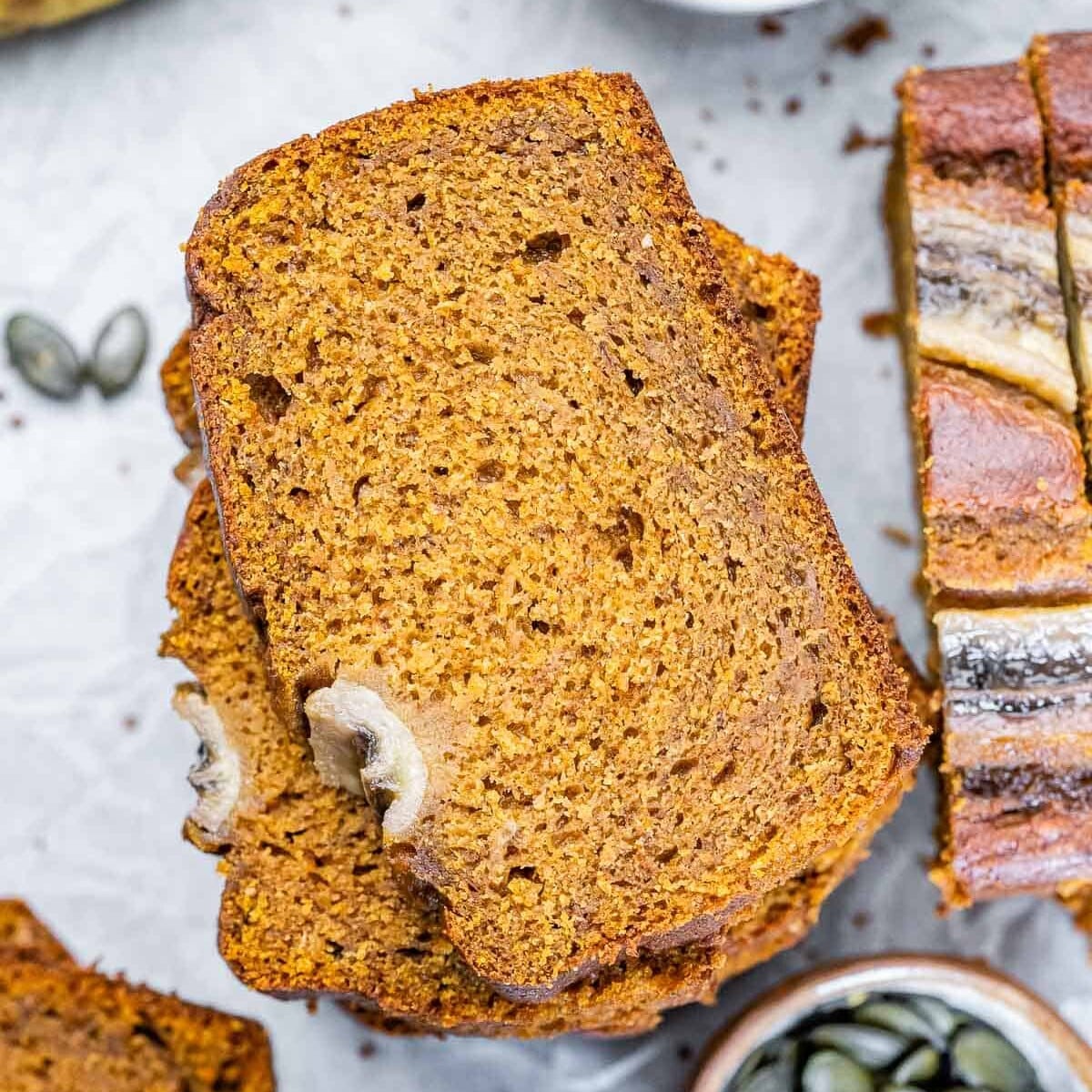 stacks of banana pumpkin bread slices.