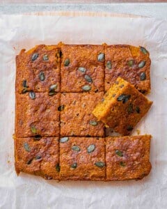 Pumpkin cake cut into squares.