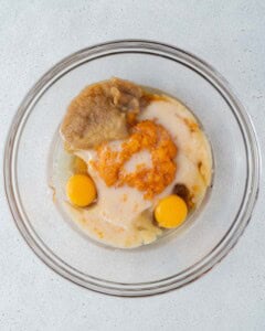 wet ingredients for sweet potato muffins added into a bowl.