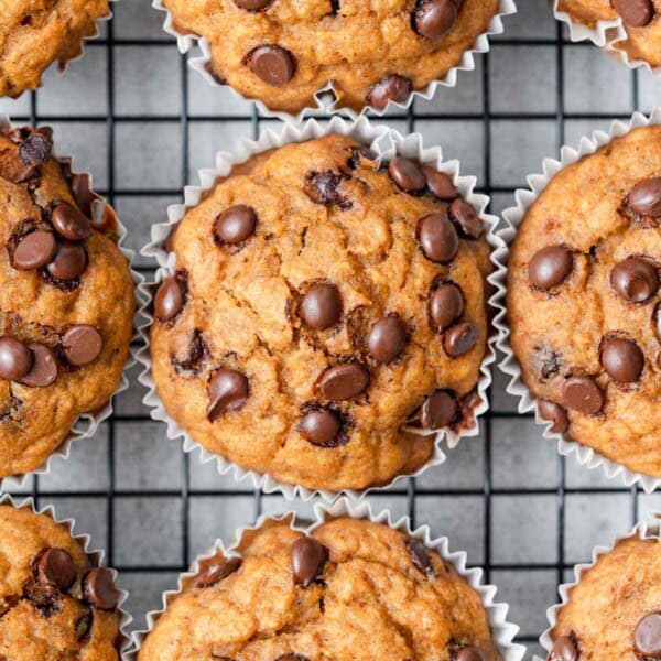 sweet potato muffins with chocolate chips on a wire wrack.