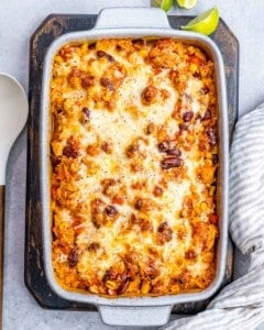 cooked Mexican chicken casserole in white dish with linen