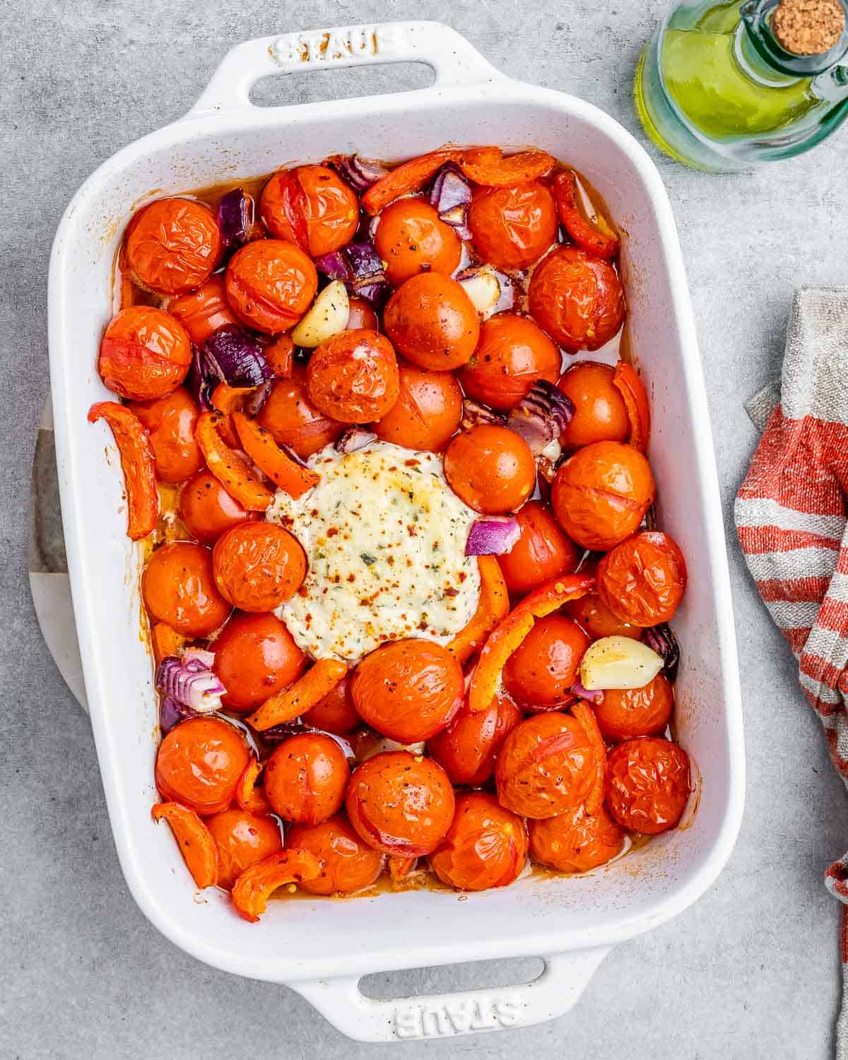 tomatoes and cheese in a baking dish baked until softened.