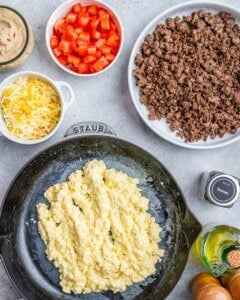 Prepped ingredients for making breakfast burritos.