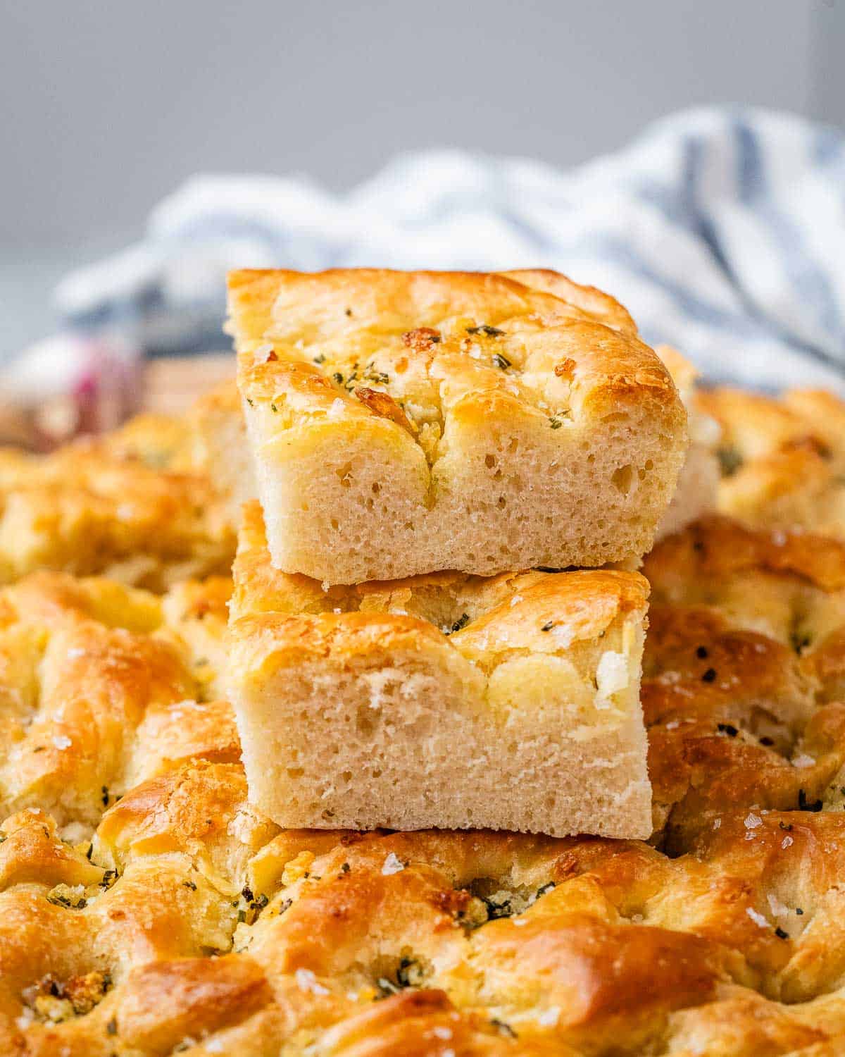 image of focaccia bread recipe stacked with two squares