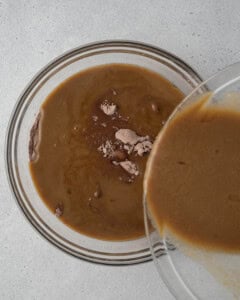 egg liquid mixture is poured over the flour.