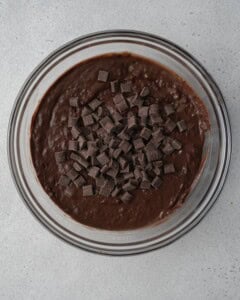 chocolate chunks are added over the chocolate batter.