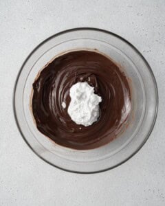 coconut cream added over melted chocolate.