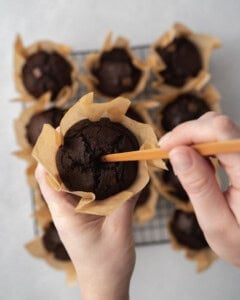 piping the chocolate muffins in the middle.