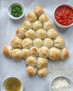 baked cheese balls on a sheet pan.