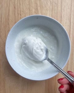 garlic yogurt sauce in a bowl.