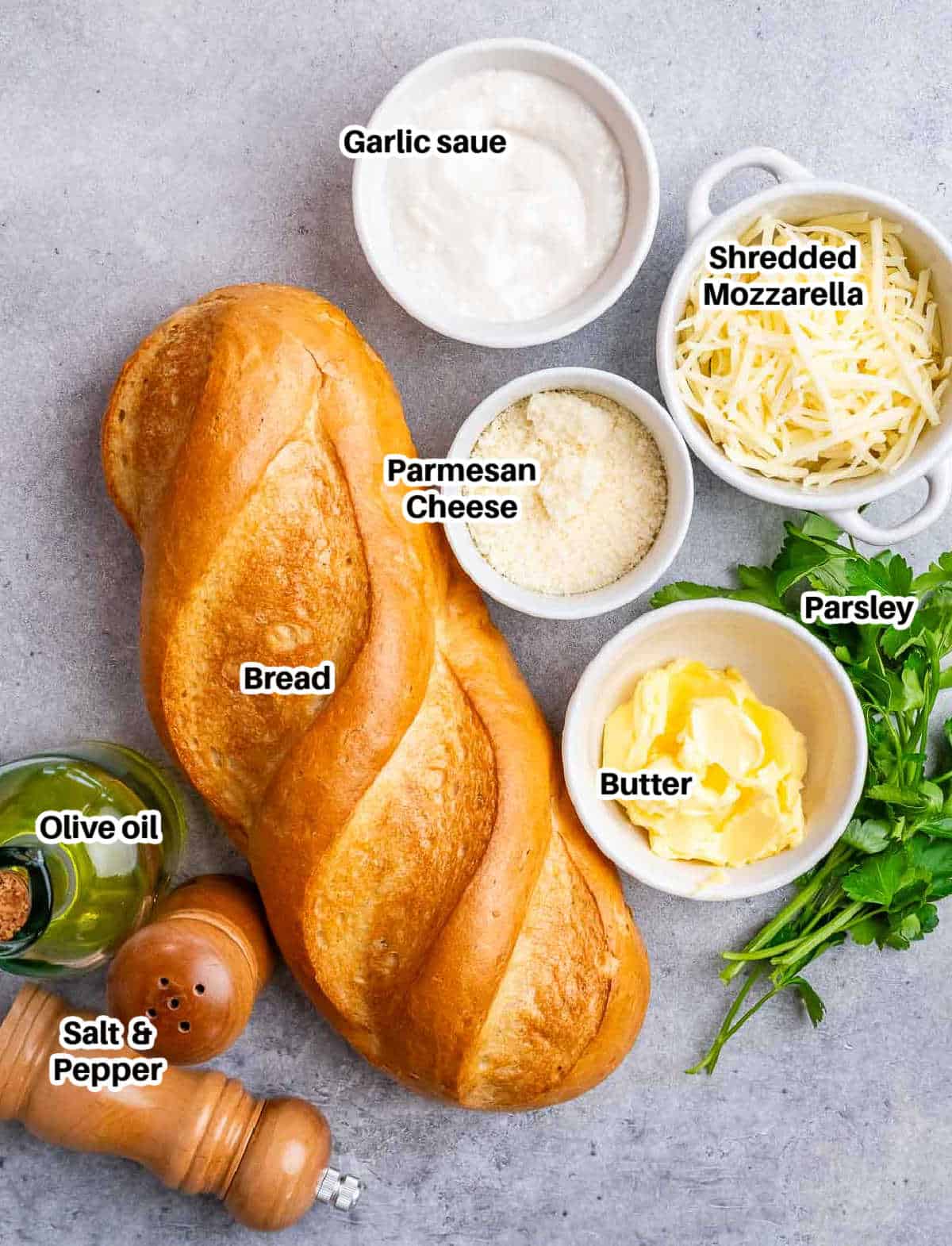 ingredients to make garlic bread laid out.