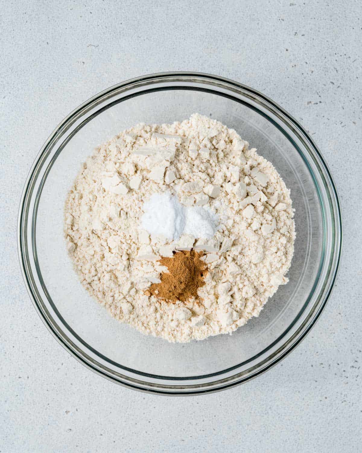 almond flour, cinnamon, baking powder, and salt, in a bowl.