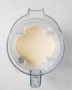 blended protein shake in a blender.
