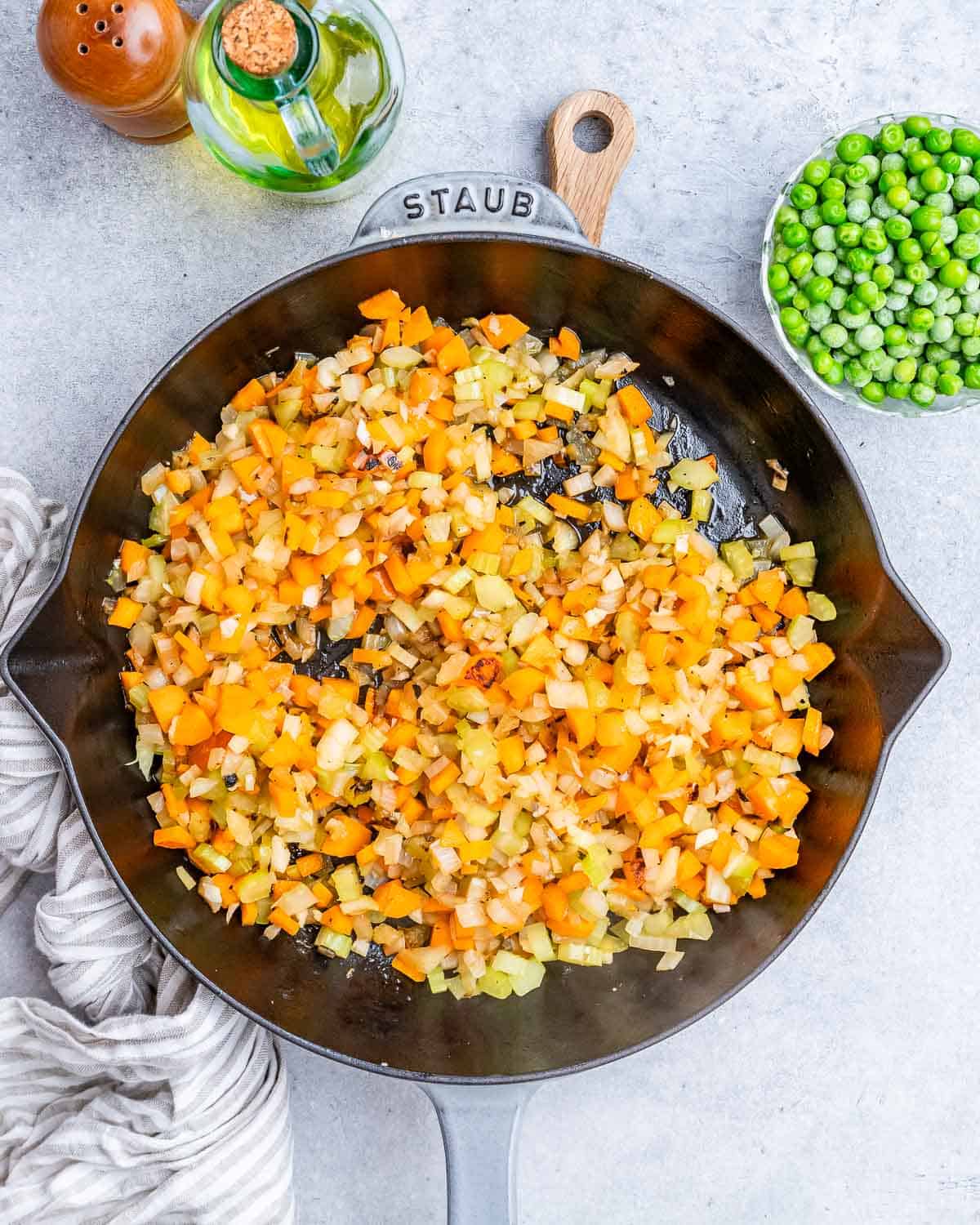 Cooked vegetables in a black skillet.