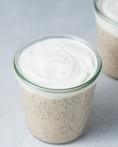 overnight oats in a jar topped with a layer of yogurt.