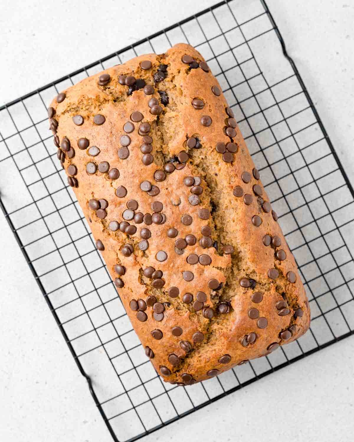 banana bread on a wire rack.