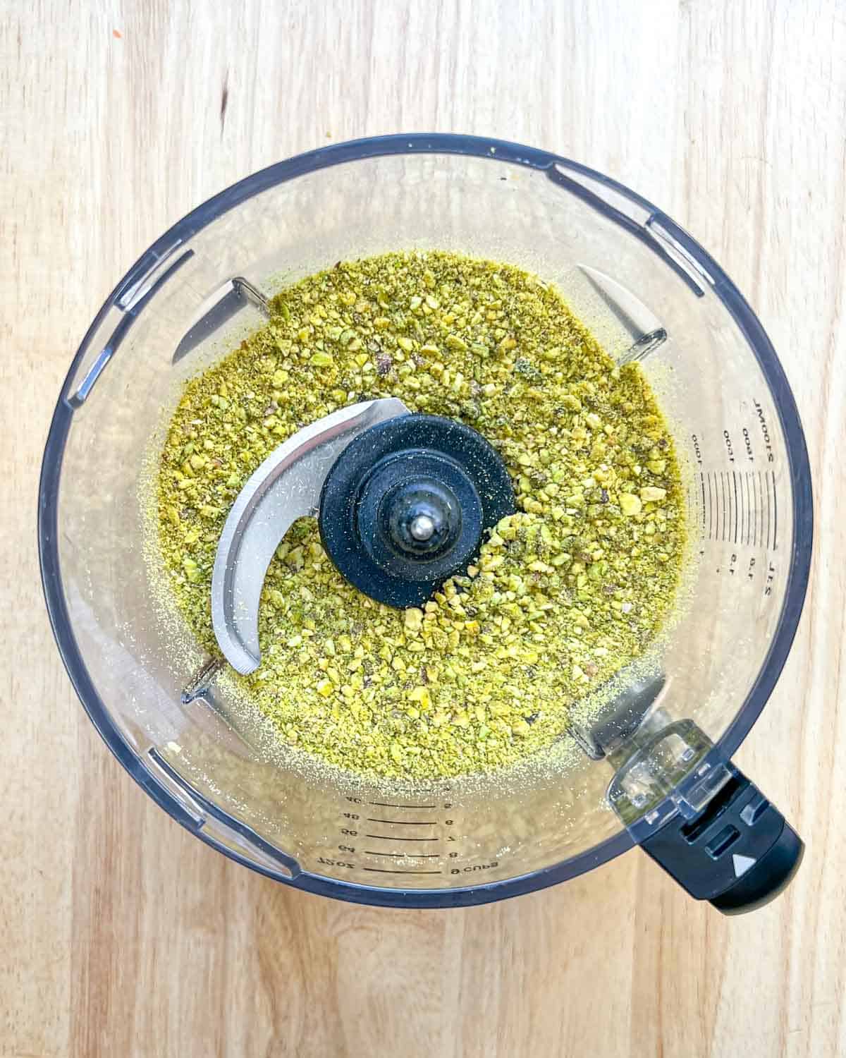 pistachio processed half way in a blender.