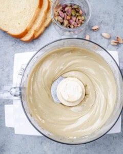 Smooth pistachio and cream cheese mixture blended in a food processor until creamy and uniform in texture.