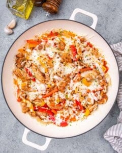 Full view of the finished Chicken Philly Cheesesteak skillet, loaded with melted cheese, chicken, and colorful vegetables.
