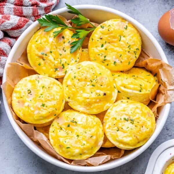 A white round bowl with egg bites.