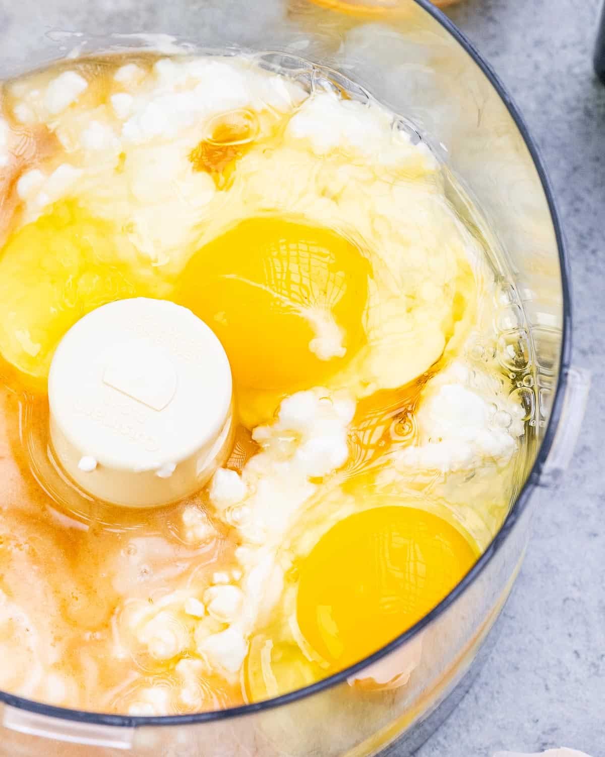 Waffle ingredients are added into a food processor.
