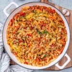 a skillet with tomato-based pasta made with ground turkey.