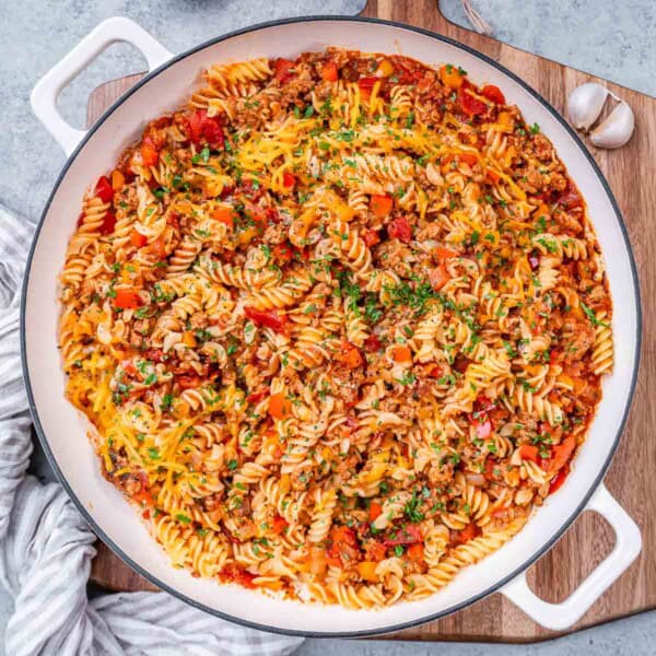 a skillet with tomato-based pasta made with ground turkey.