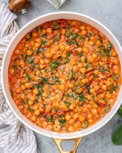 Chickpeas, spinach, and sauce combined into a creamy Tuscan-style mixture.