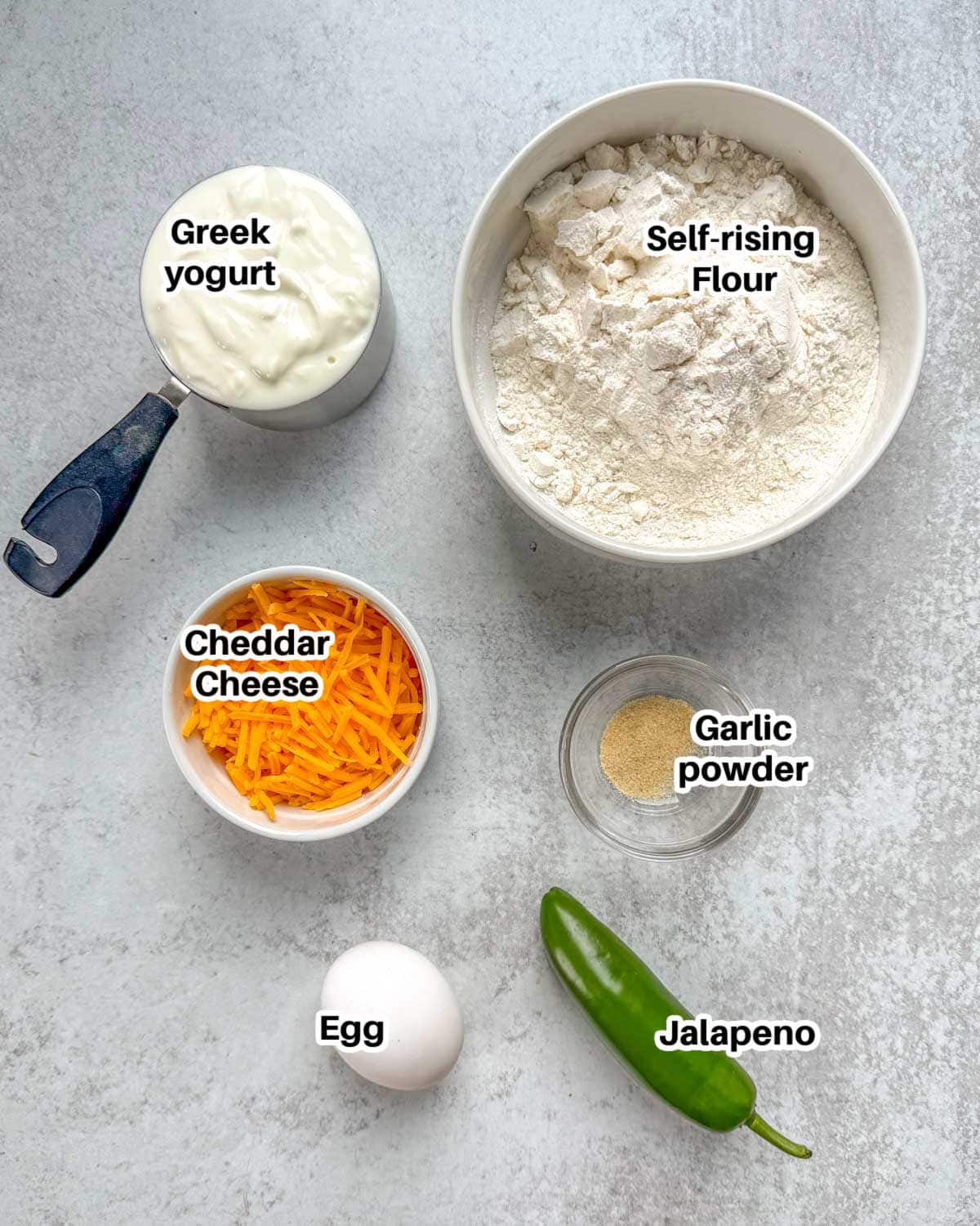 Ingredients to make cheddar bagels with jalapenos. 