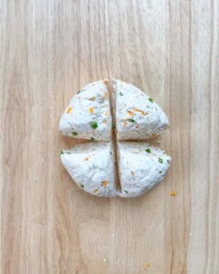 dough divided into 4 sections.