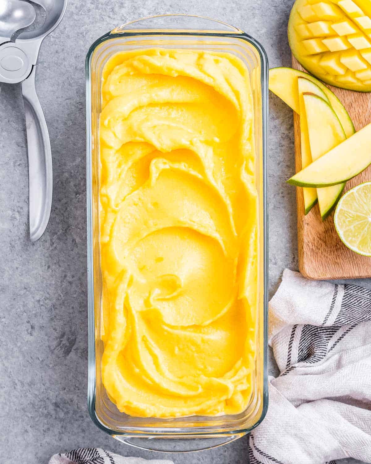 a rectangular bowl with mango sorbet.