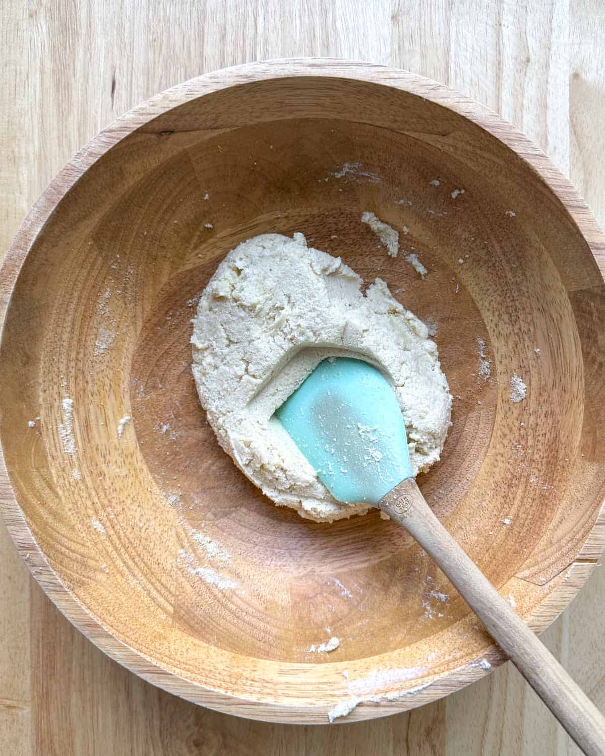 Spatula in a bowl with the bagel dough.