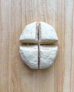 Dough is divided into 4 sections.