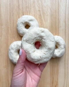 Dough formed into bagels.