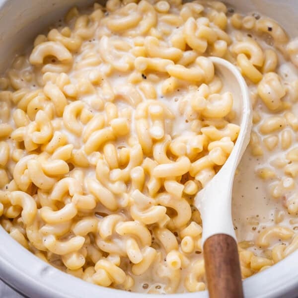 mac and cheese in a bowl with spoon in bowl.
